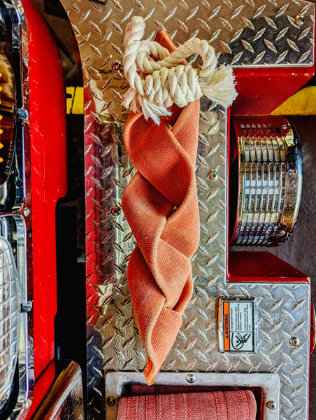 Fire hose braided tug with cotton rope handle made from 100% real up-cycled repurposed fire hose