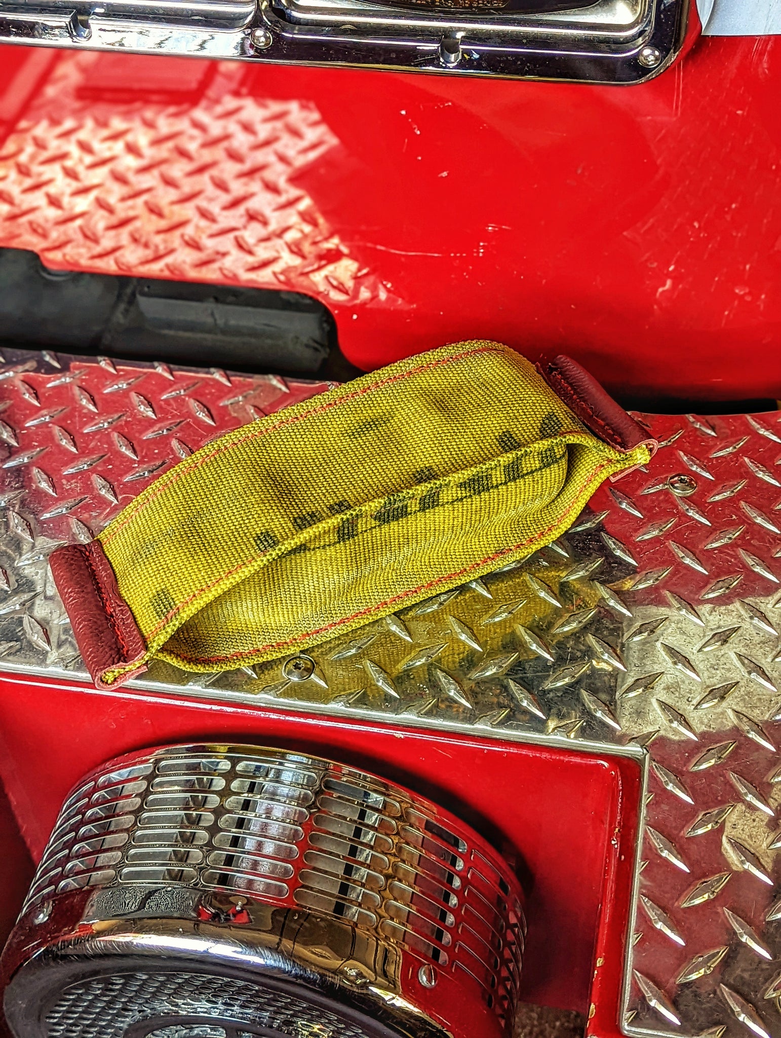 Interactive fire hose dog toy with (crinkly dry bean filled water