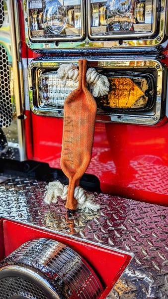 Squeak toy with reinforced cotton fiber rope tassels made from heavy-duty repurposed fire hose firefighter gift for large breed dogs