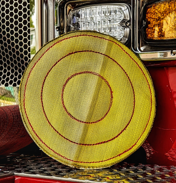 Repurposed fire hose Frisbee for dogs made from multi-layers of heavy-duty durable upcycled fire hose an excellent gift for large breed dogs
